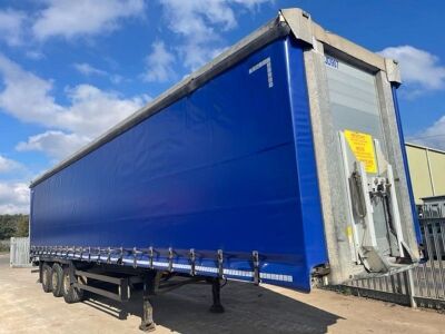 2010 Schmitz Triaxle Curtainside Trailer