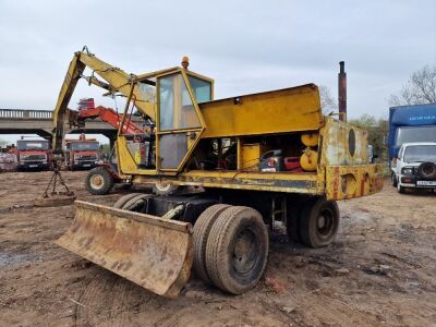 Sennebogen Wheeled Scrap Handler