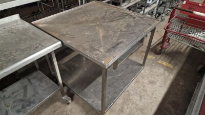 Wheeled Stainless Steel Counter Complete With Drain Hole and Shelf