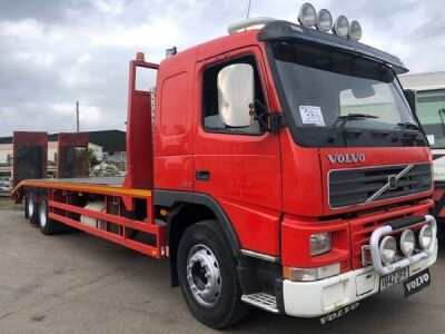 1999 Volvo FM12420. 6x2 Rear Lift Beavertail 